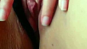 Amateur brunette Morocha masturbates on phone with her big clit and natural tits